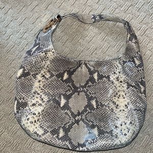 Michael Kors snakeskin purse.